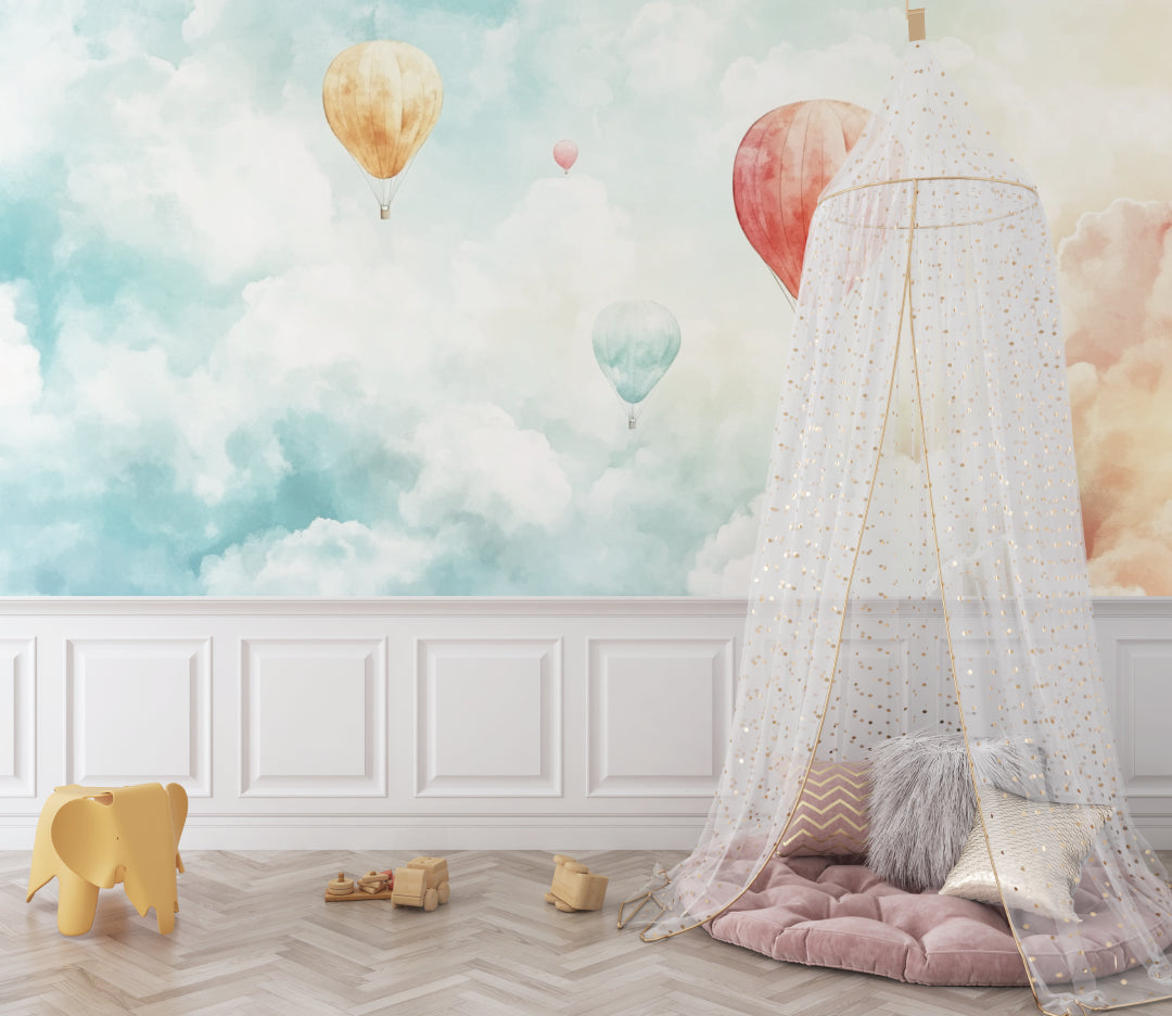 Hot air balloon wallpaper creating a dreamy atmosphere in a bright nursery with white furniture