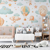 Pastel hot air balloon mural creating magic in a child's reading nook