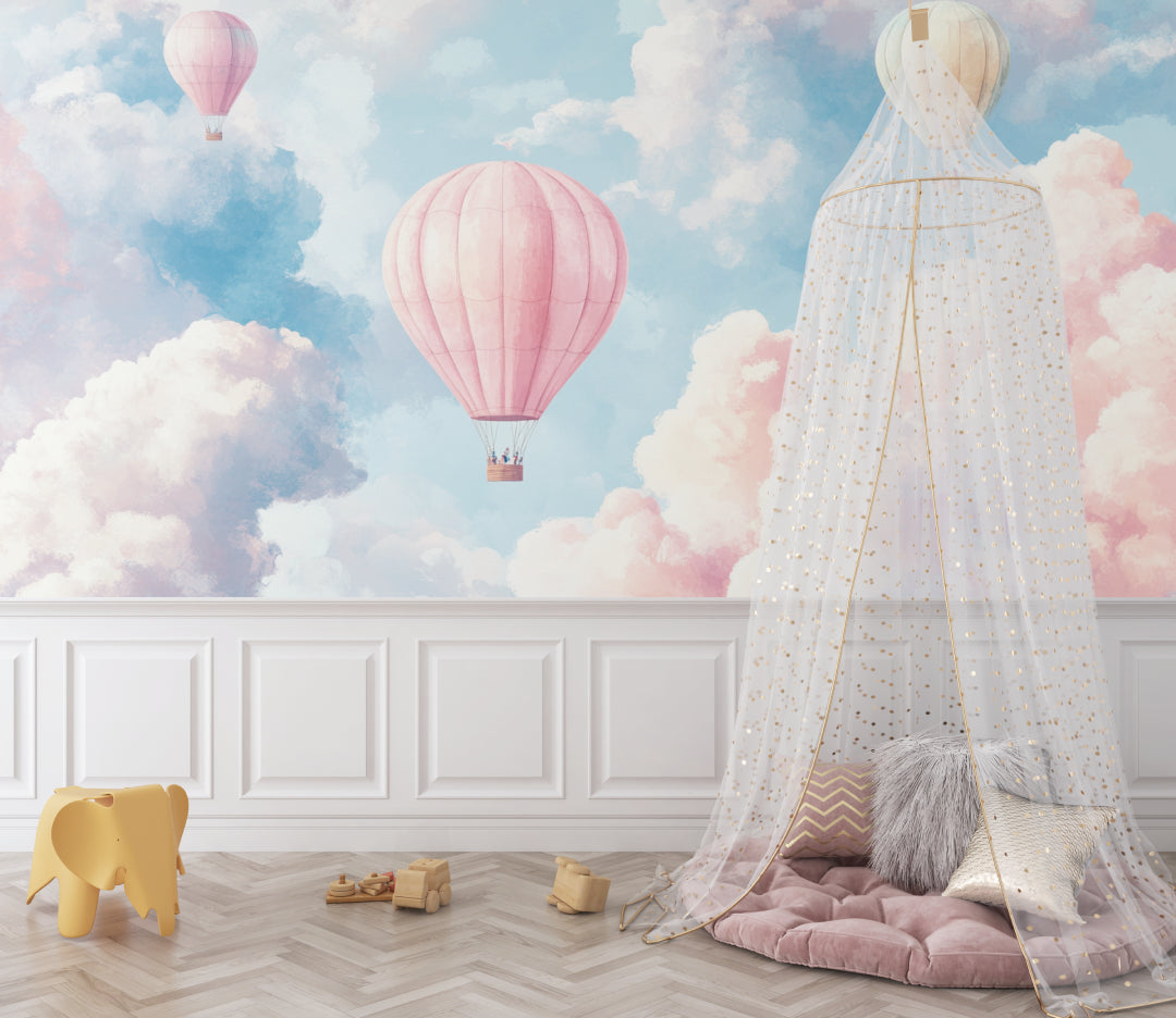 Pink and blue balloon mural in a child's playroom creating a dreamy atmosphere