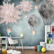 Hot air balloon nursery wallpaper creating a magical atmosphere in a modern baby's room with soft pink and grey tones