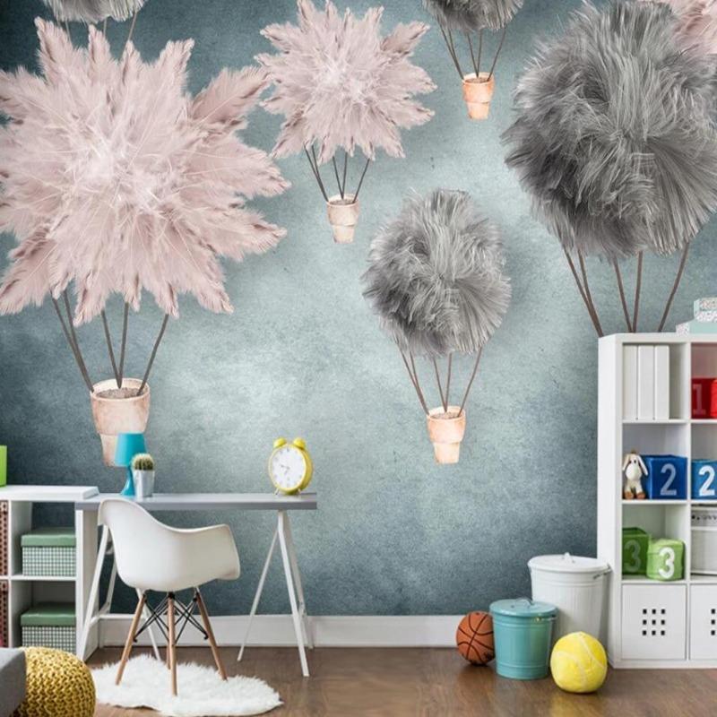 Hot air balloon nursery wallpaper creating a magical atmosphere in a modern baby's room with soft pink and grey tones