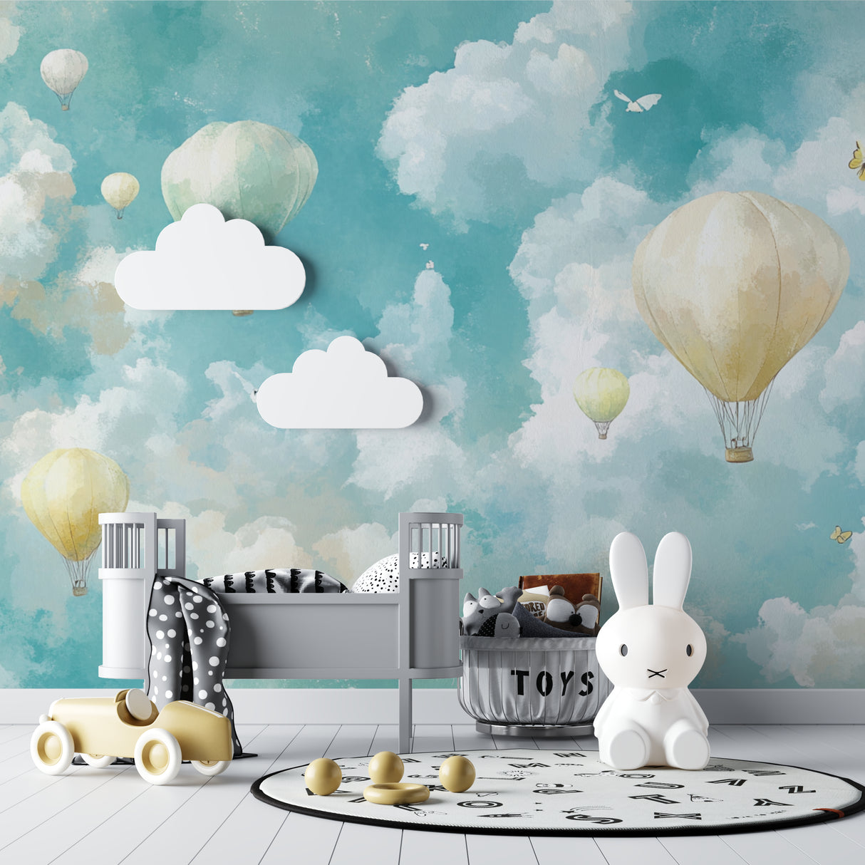 Kids bedroom featuring hot air balloon mural with turquoise sky and cream balloons