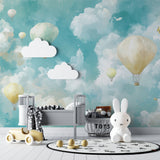 Kids bedroom featuring hot air balloon mural with turquoise sky and cream balloons