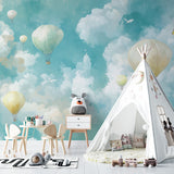 Reading nook with hot air balloon wall mural showing gentle cloud details