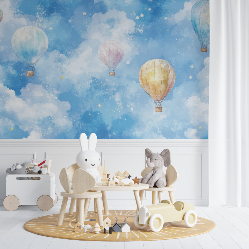 Kids bedroom featuring hot air balloon mural wallpaper with silver stars above a reading nook