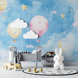 Kids bedroom featuring hot air balloon mural with dreamy clouds and twinkling stars