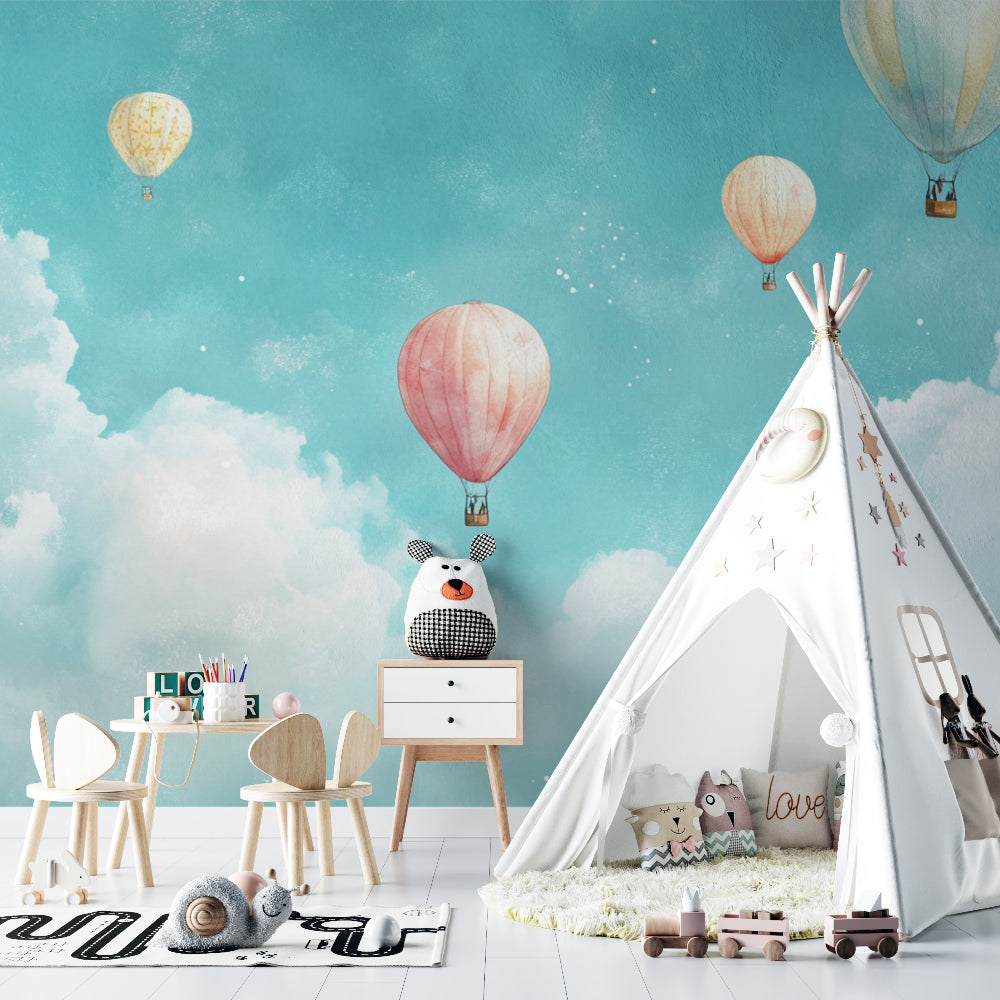 Hot air balloon wallpaper in bright nursery with white furniture creates peaceful sleeping space
