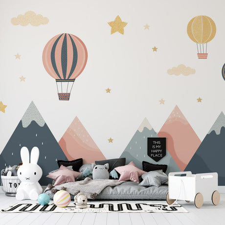 Hot air balloon nursery wallpaper creates dreamy atmosphere in modern Scandinavian nursery with white furniture