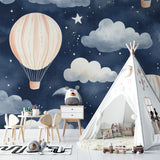 Dreamy hot air balloon wallpaper brightening a modern playroom space