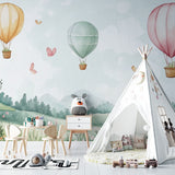 Pastel hot air balloon mural brightening a child's reading nook with soft, playful colors
