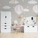 Hot air balloon wall mural creating dreamy atmosphere in toddler's playroom