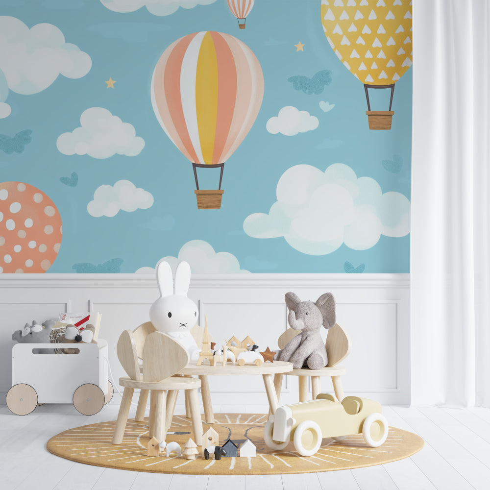 Kids bedroom featuring hot air balloon mural wallpaper with soft pastel colors and playful cloud patterns
