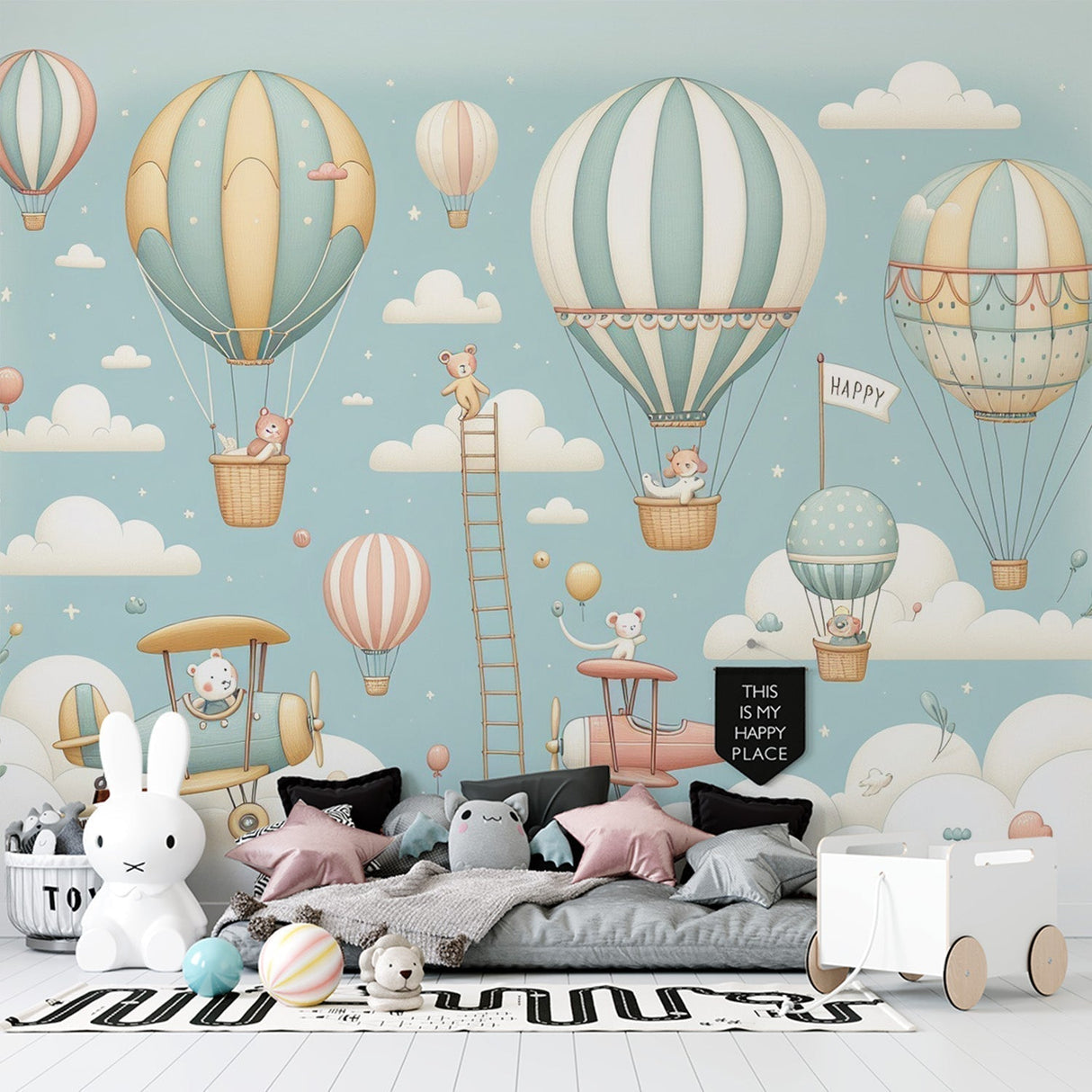 Hot air balloon nursery wallpaper with teddy bears creates a dreamy atmosphere in a modern white and gray nursery with rocking chair