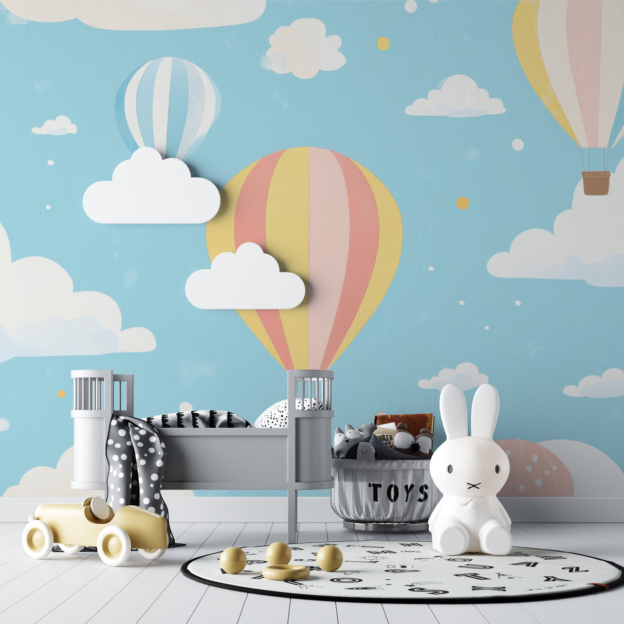 Playroom with balloon wallpaper mural showing peaceful sky scene and gentle pastel tones