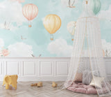Hot air balloon mural in a playroom showing scale and soft color impact