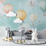 Balloon and birds wallpaper in a modern kids bedroom with minimal decor