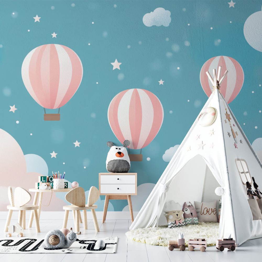 Pink and blue hot air balloon wall mural brightening a cozy reading nook in a child's bedroom