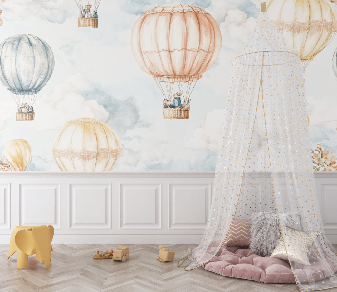 Watercolor balloon mural creating a dreamy atmosphere in a kid's reading nook