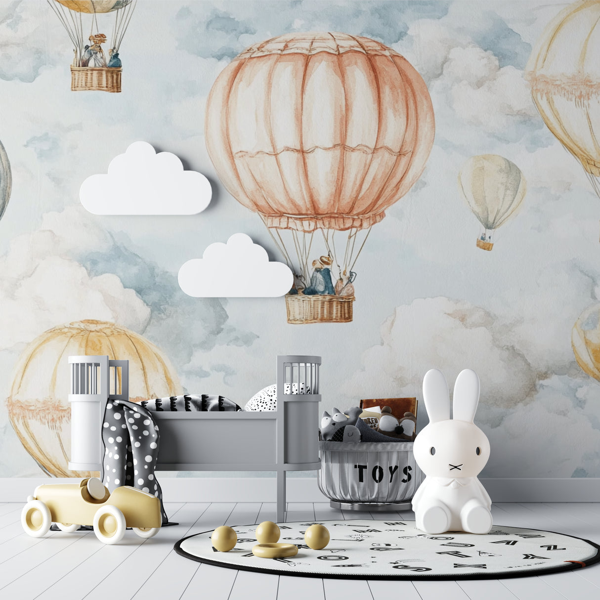 Vintage balloon wallpaper adding whimsy to a toddler's bedroom