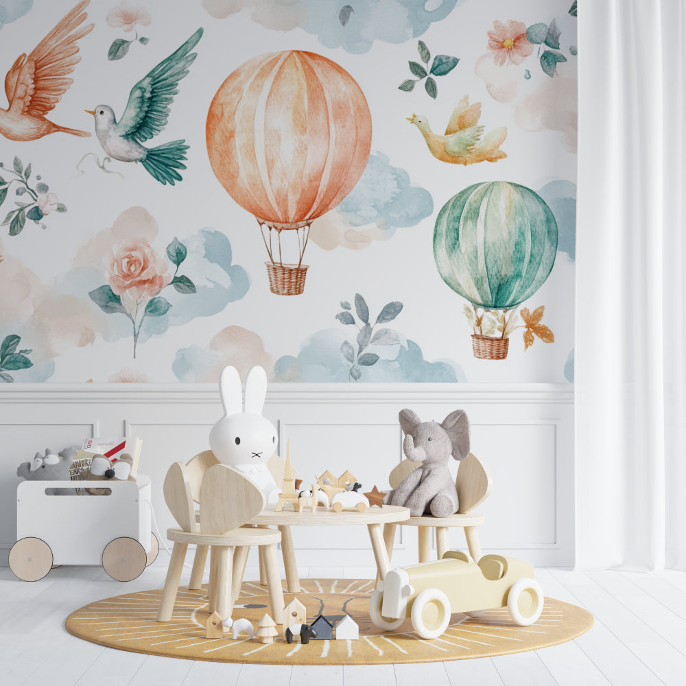Hot air balloon nursery wallpaper creating a magical atmosphere in a cozy white nursery with rocking chair