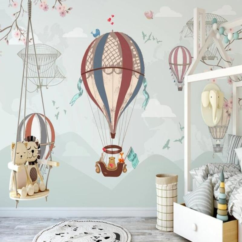 Adventure balloon mural creating magic in a playful kids bedroom with reading nook