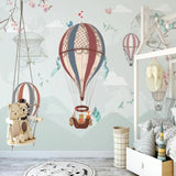 Adventure balloon mural creating magic in a playful kids bedroom with reading nook