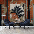 Industrial brick wallpaper with palm silhouette creating depth in a modern loft living room with high ceilings