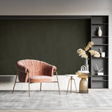 Green textured wallpaper creating depth in minimalist living room
