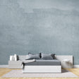 Grey concrete effect wallpaper in modern living room showing urban industrial style