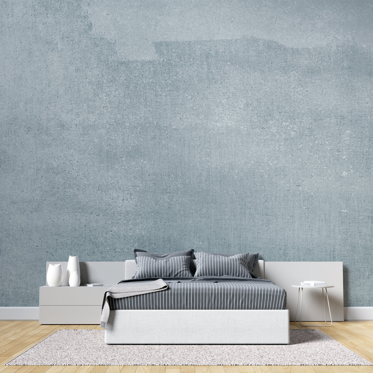 Grey concrete effect wallpaper in modern living room showing urban industrial style