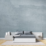 Grey concrete effect wallpaper in modern living room showing urban industrial style
