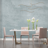 Concrete effect wall mural in dining room with natural lighting