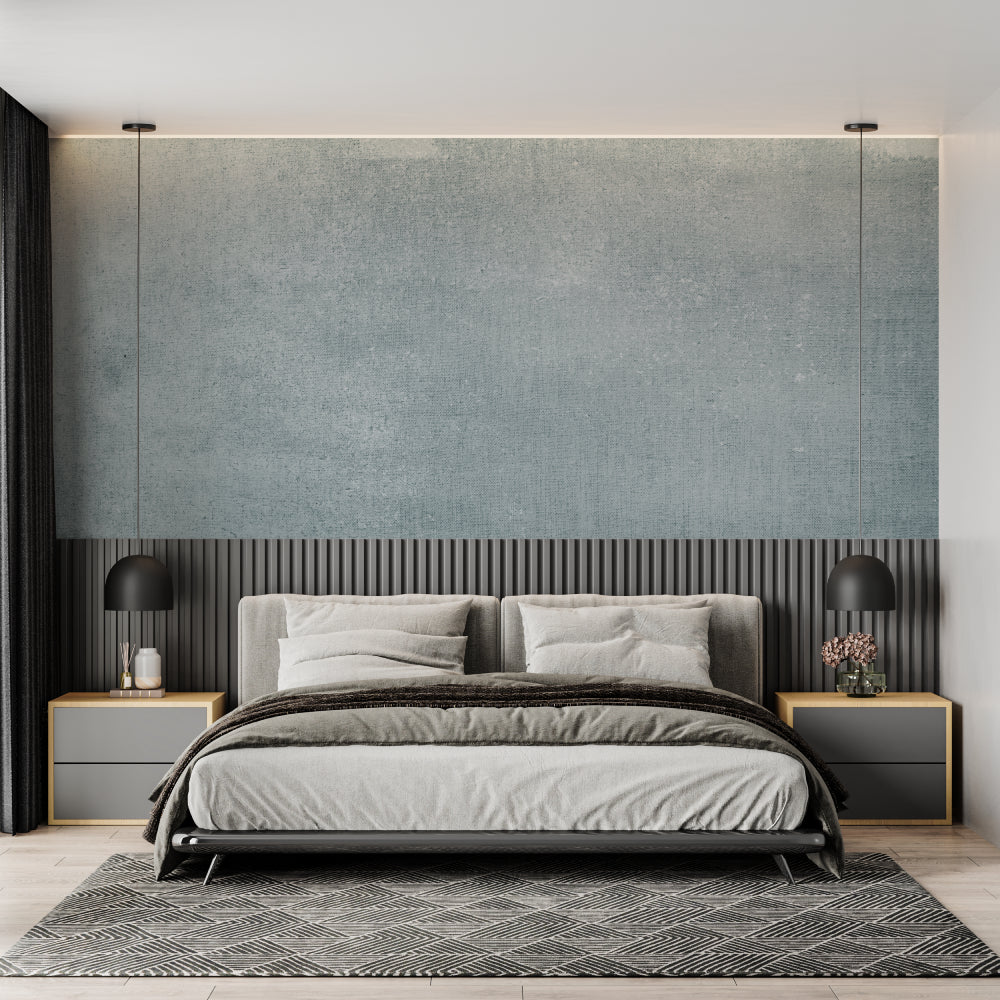 Grey textured concrete wallpaper in bedroom creating calm mood