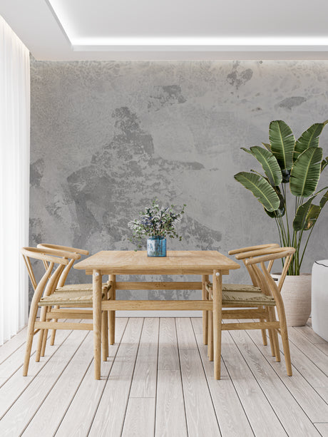 Modern concrete effect wallpaper in minimalist living room showing urban texture and depth