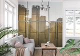 Gold window pattern adding architectural interest to a contemporary hallway