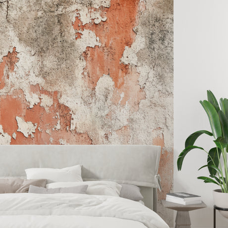 Concrete effect wallpaper in modern living room showing warm terracotta tones and textured surface