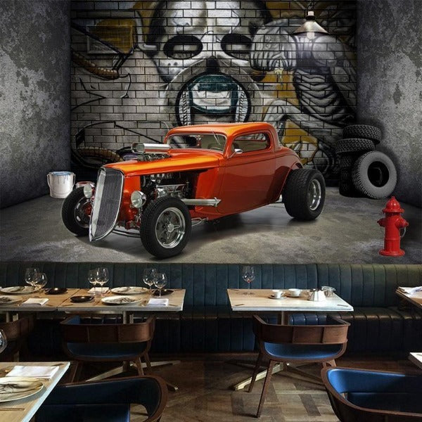 Street art hot rod wallpaper in teenage bedroom with industrial furniture and urban decor