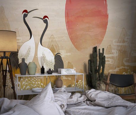 Japanese crane wallpaper in modern living room showing two white birds against warm desert sunset