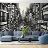 Japanese manga city wallpaper bringing urban style to a modern living room with black and white tones
