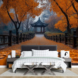 Japanese garden wallpaper creating a cozy atmosphere in a modern living room with autumn colors and pagoda view