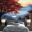 Japanese landscape wallpaper with red maple tree and mountains shown in a modern living room setting with minimal furniture