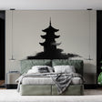 Japanese pagoda wallpaper creating a peaceful atmosphere in a modern living room with minimalist furniture