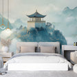 Japanese temple wallpaper creating a serene atmosphere in a modern living room with minimal furniture