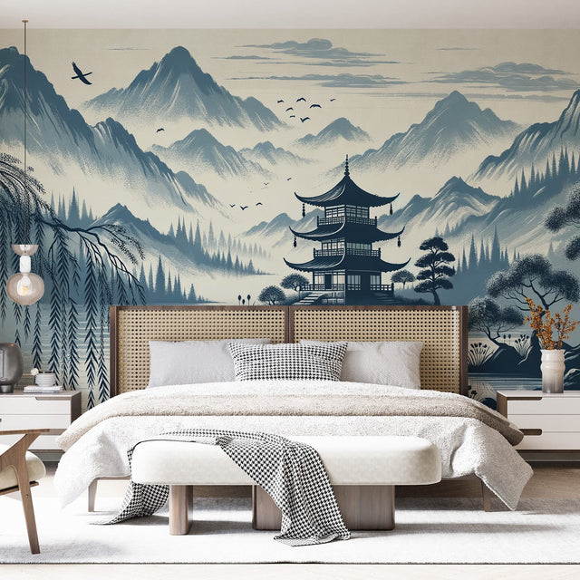 Japanese pagoda wallpaper creating depth in a modern living room, blue-grey misty mountain scene adds serenity