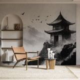 Japanese pagoda wallpaper in modern minimalist living room, creating zen atmosphere with black and white mountain art