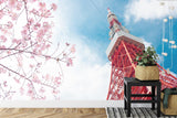 Japanese wall mural featuring Tokyo Tower in modern living room with grey sofa and minimalist decor