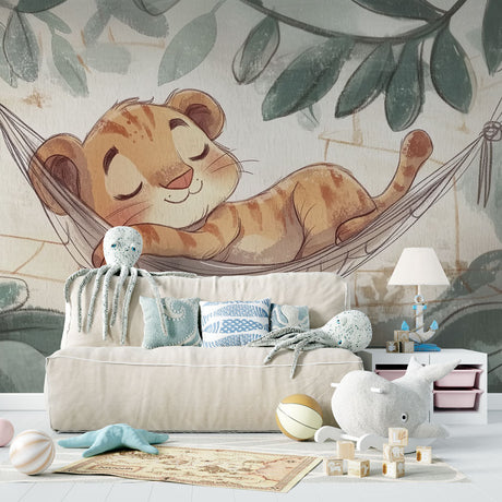 Baby lion wallpaper mural shown in a cozy nursery with soft lighting and natural wood furniture