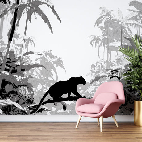 Black Panther jungle wallpaper creating drama in a modern living room with minimal furniture and natural light