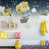 Playroom wall with flying elephants mural creating a magical story corner
