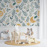 Moon and Stars Pattern Wallpaper creating a magical atmosphere in a children's reading nook
